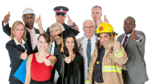 A group of public service professionals standing together with a white background. They are smiling and looking at the camera with thumbs up. Student loan relief. PSLF program.